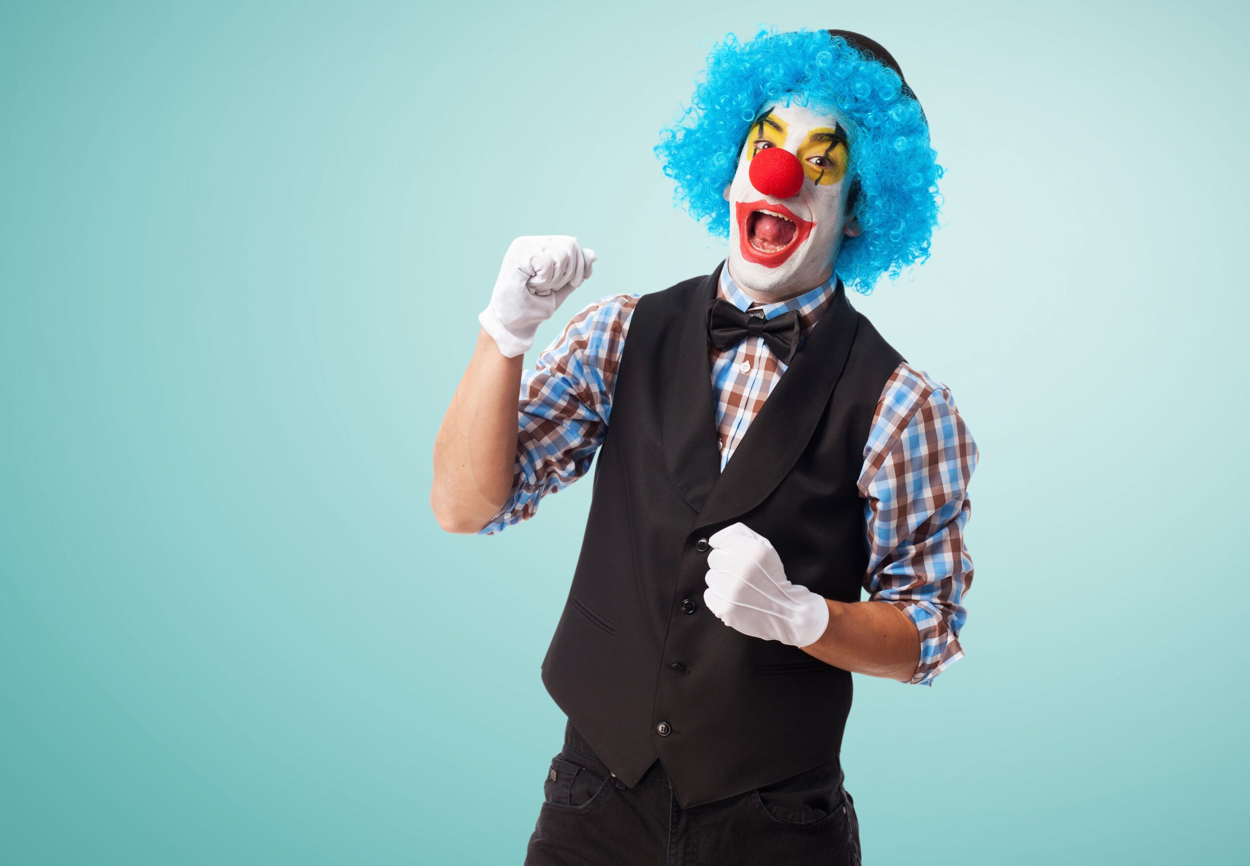 clown-smiling-with-fist-high-min