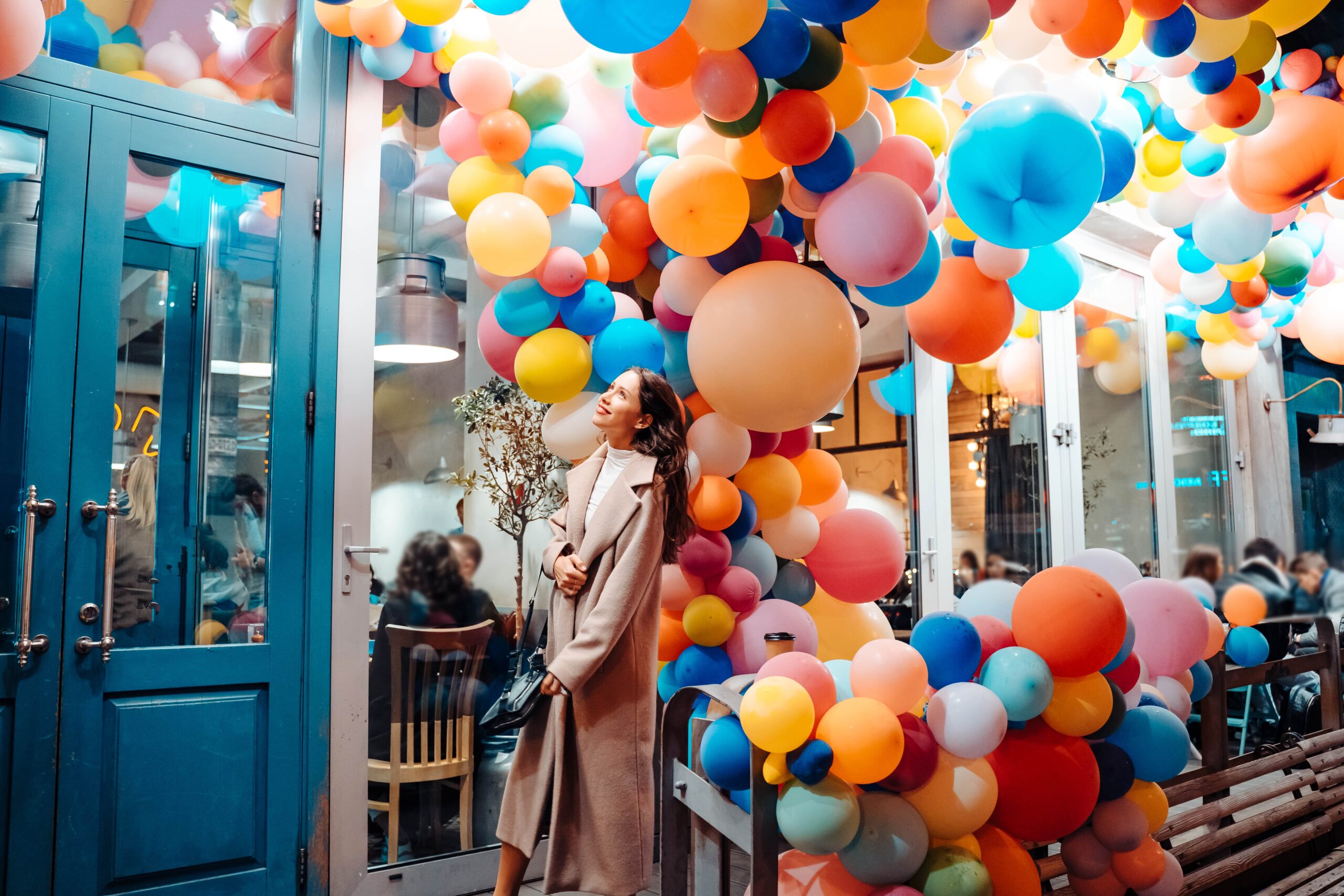 woman-with-colorful-balloons-min